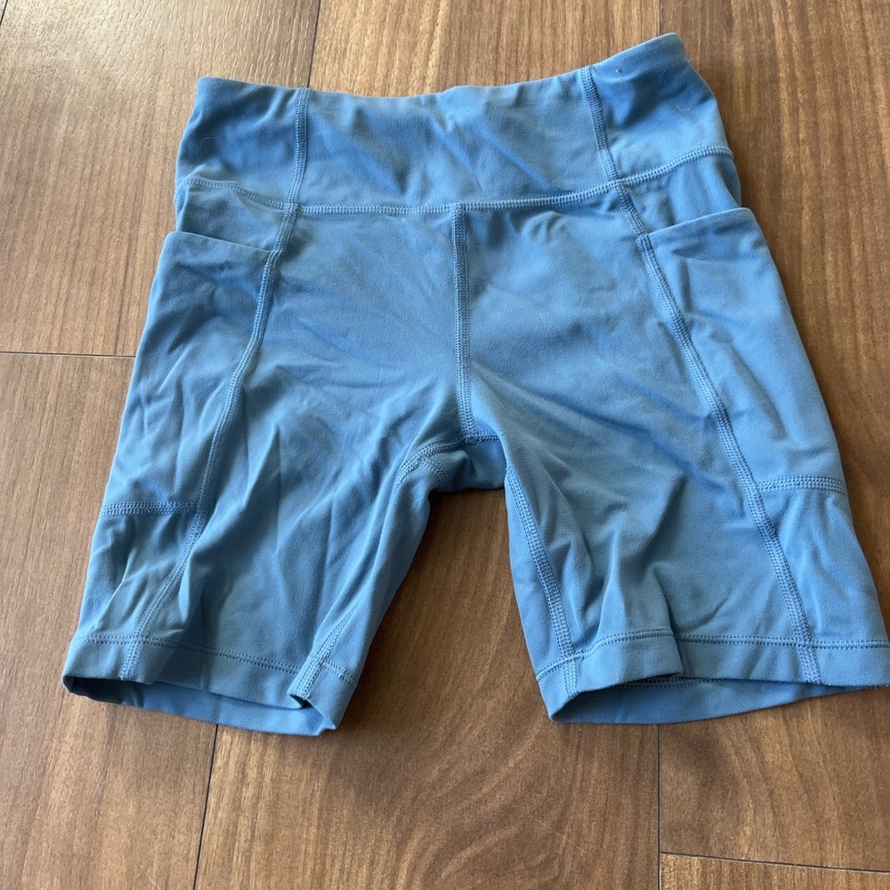 Athleta girl M 8/10 blue biker shorts